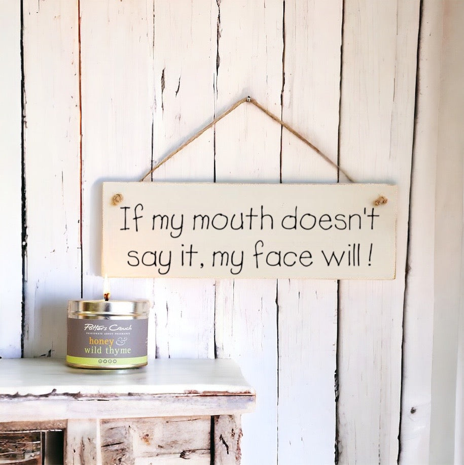 `If my mouth doesn’t say it’  Wooden Wall Sign