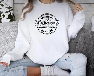 Surviving Motherhood White Sweatshirt